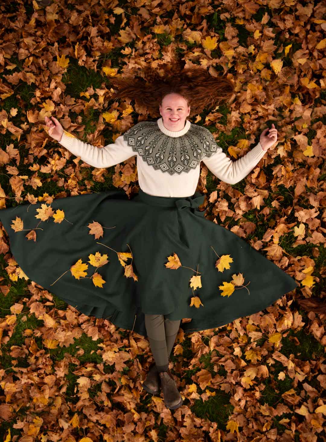 The sweater is perfect with the Matilde riding skirts in Forest and Bottle Green (pictured)